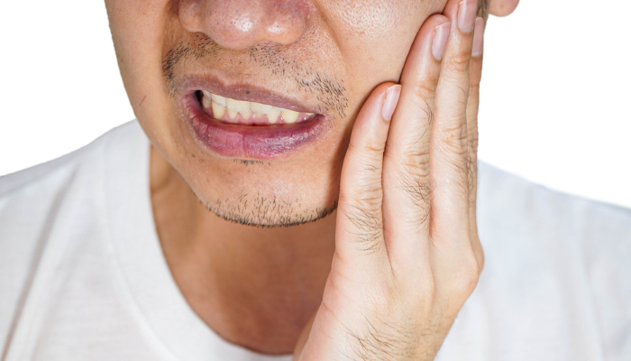 Homem com dor de dente